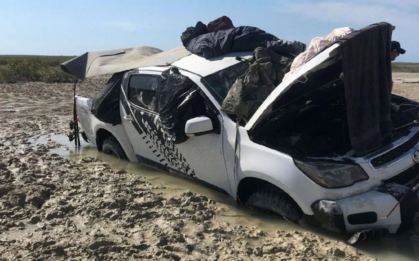 Men in 4x4 stuck in mud made farewell videos as crocodiles circled
